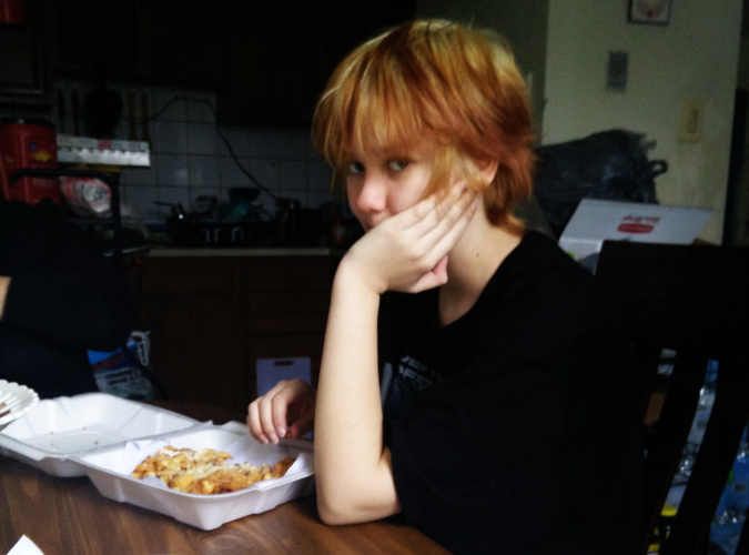 Riley eating funnel cake